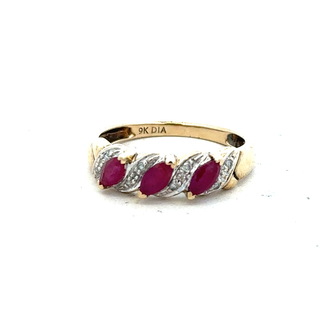 9ct yellow gold ruby and diamond ring, size L, featuring a central ruby and accent diamonds, unbranded jewelry.