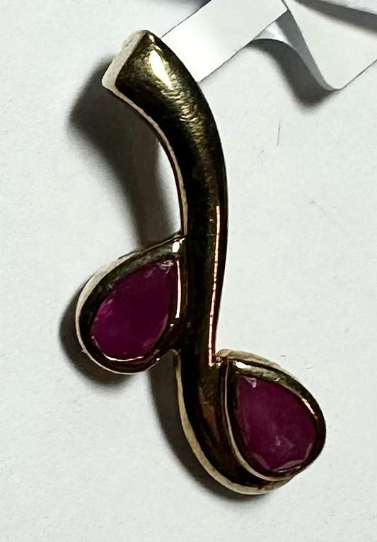 9ct yellow gold ruby pendant featuring a vibrant red ruby gemstone, weighing 1.2 grams, unbranded jewelry accessory.