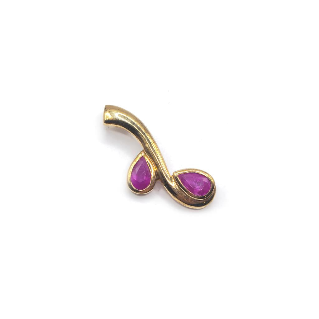 9ct yellow gold ruby pendant with a polished finish, featuring a vibrant red ruby gemstone, weighs 1.2 grams.