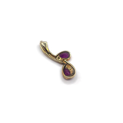 9ct yellow gold ruby pendant showcasing a vibrant red ruby gemstone on a delicate gold chain, unbranded jewelry piece.