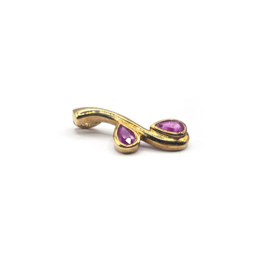 9ct yellow gold ruby pendant with a polished finish, featuring a vibrant red ruby gemstone on a delicate gold chain.