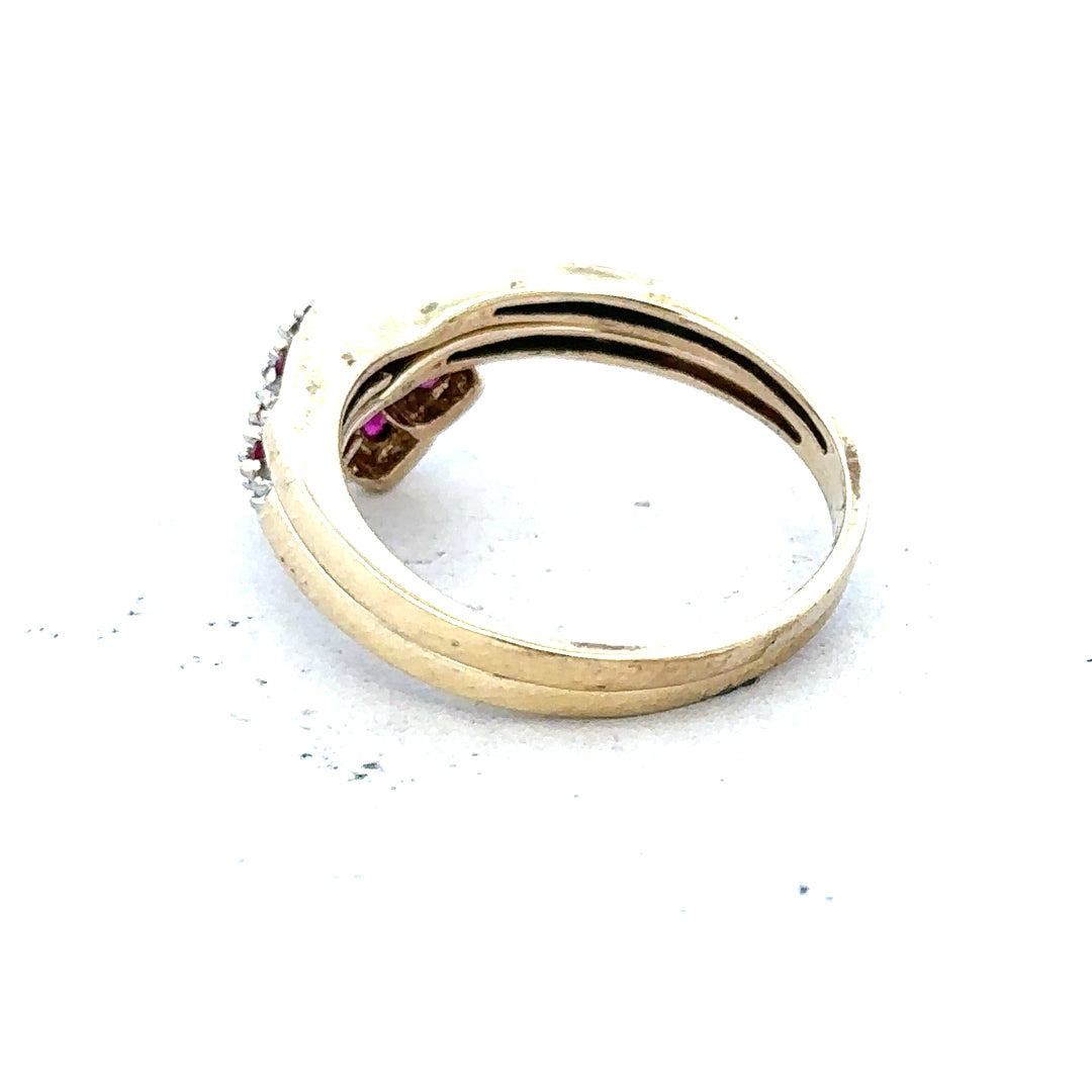 9ct yellow gold ruby ring in size O with a central red ruby gemstone, unbranded jewelry piece.