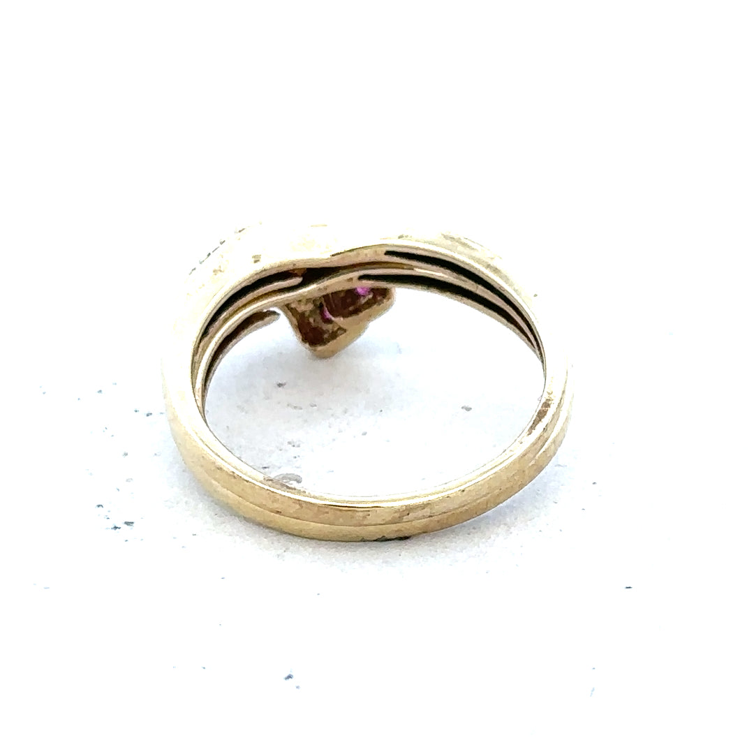 9ct yellow gold ruby ring in size O, featuring a vibrant red ruby gemstone set in a sleek gold band.