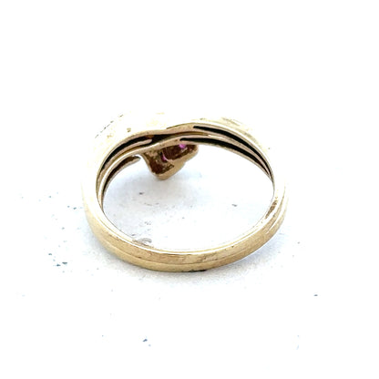 9ct yellow gold ruby ring in size O, featuring a vibrant red ruby gemstone set in a sleek gold band.