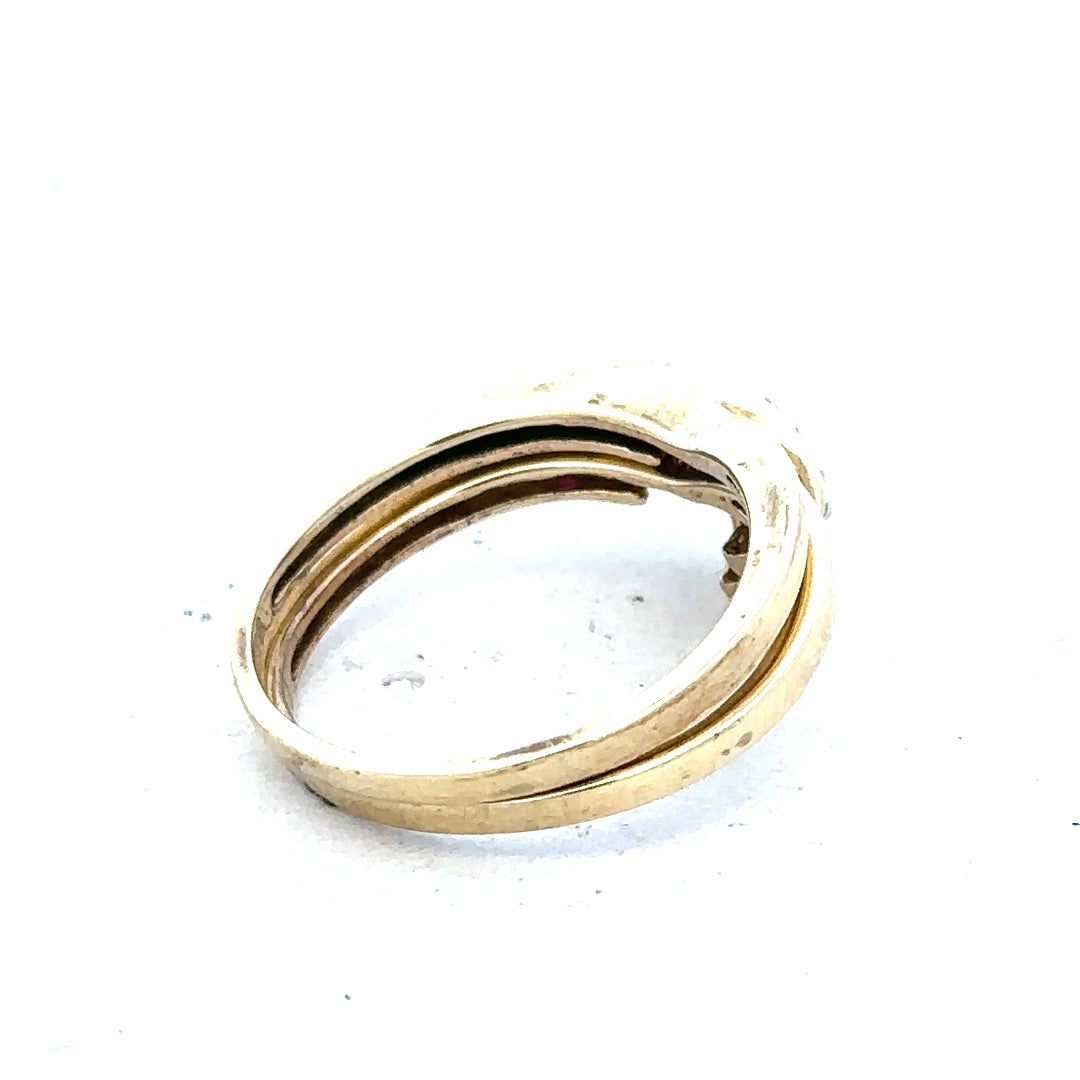 9ct yellow gold ruby ring in size O with a central red ruby gemstone, showcasing a simple elegant design.
