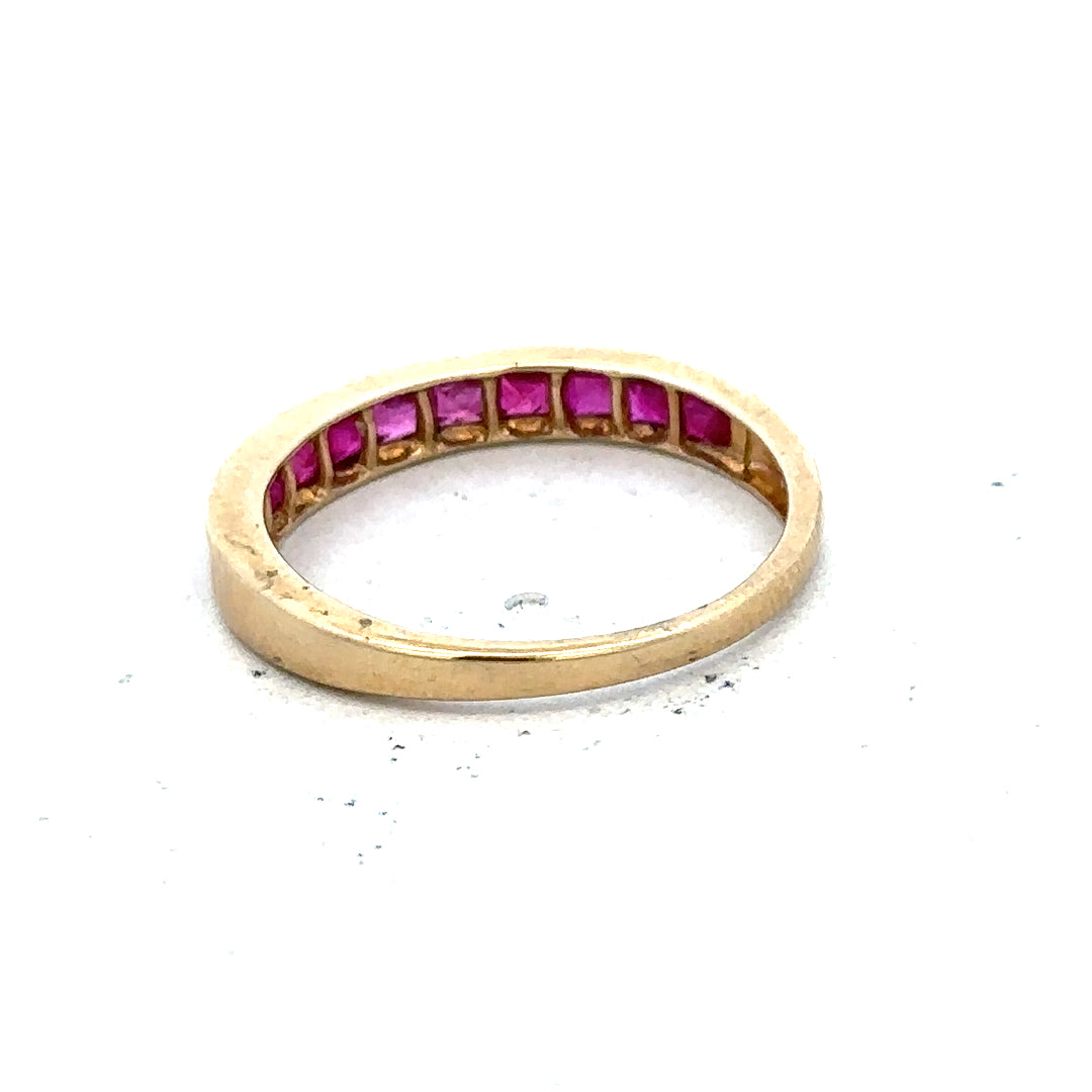 9ct yellow gold ruby ring size P1/2, unbranded elegant jewelry piece with a central ruby gemstone and gold band.
