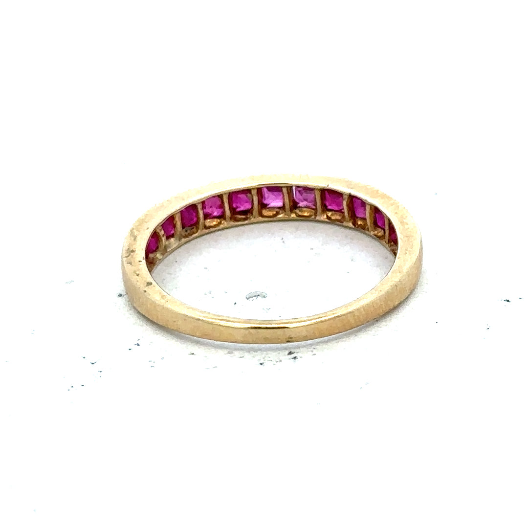Yellow gold ruby ring in size P1/2 featuring a vibrant ruby gemstone set in 9ct gold.