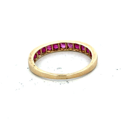 Yellow gold ruby ring in size P1/2 featuring a vibrant ruby gemstone set in 9ct gold.
