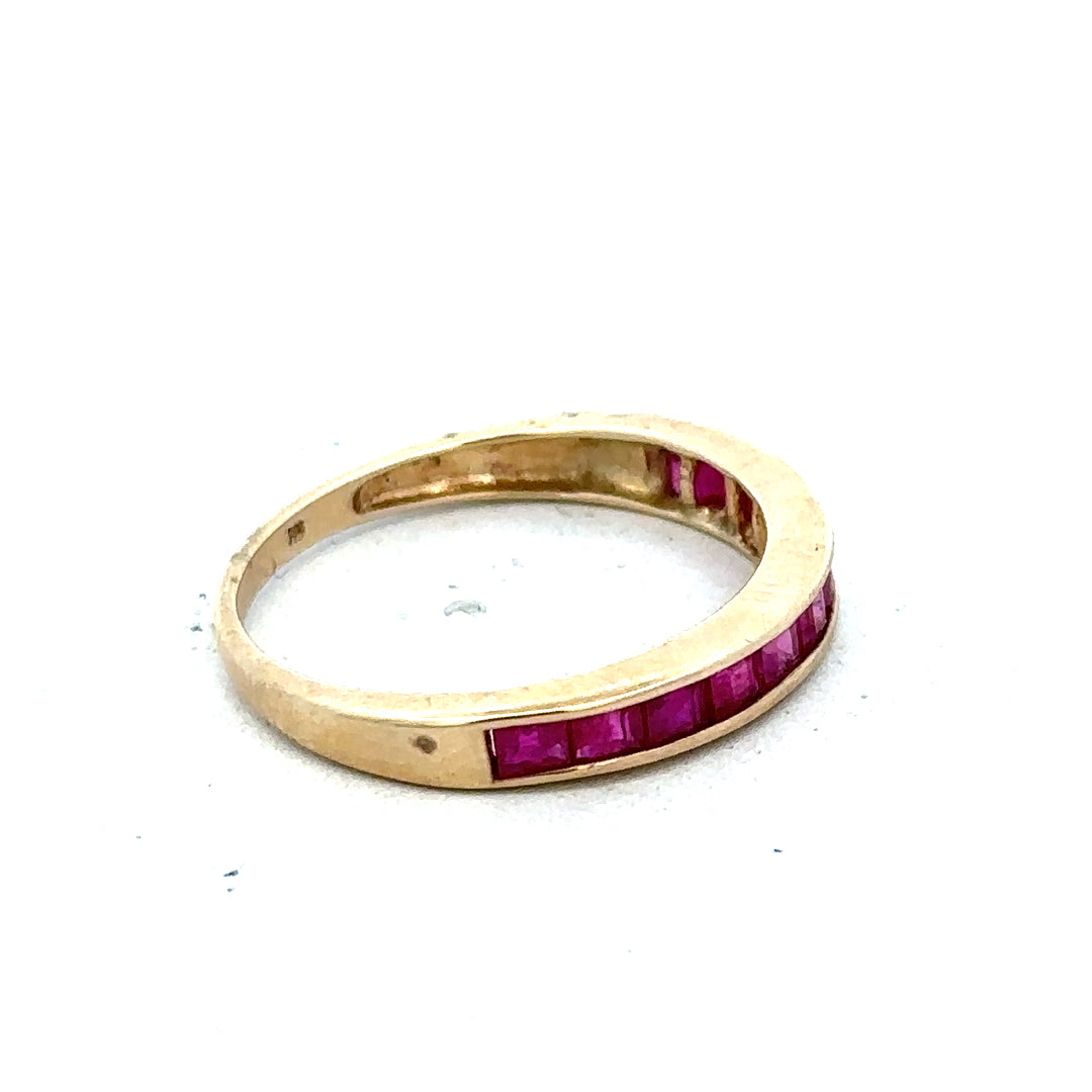 9ct yellow gold ruby ring size P1/2 with a central ruby gemstone and polished gold band, unbranded jewelry.