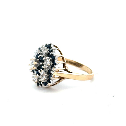 9ct yellow gold sapphire and diamond ring, size K, featuring a central sapphire gemstone with surrounding diamonds.