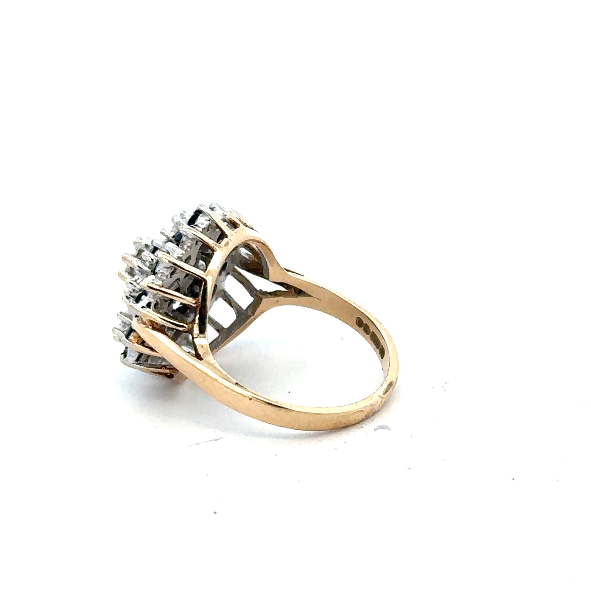 9ct yellow gold sapphire and diamond ring in size K, featuring a sleek design with sparkling gemstones.