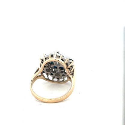 9ct yellow gold sapphire and diamond ring in size K, featuring a polished gold band with sparkling gemstones.