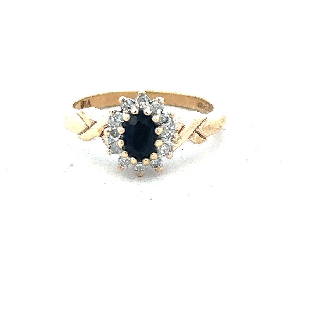 9ct yellow gold sapphire and diamond ring in size K1/2, featuring a central sapphire and sparkling diamonds on a classic band.