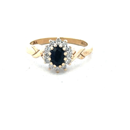 9ct yellow gold sapphire and diamond ring in size K1/2, featuring a central sapphire and sparkling diamonds on a classic band.