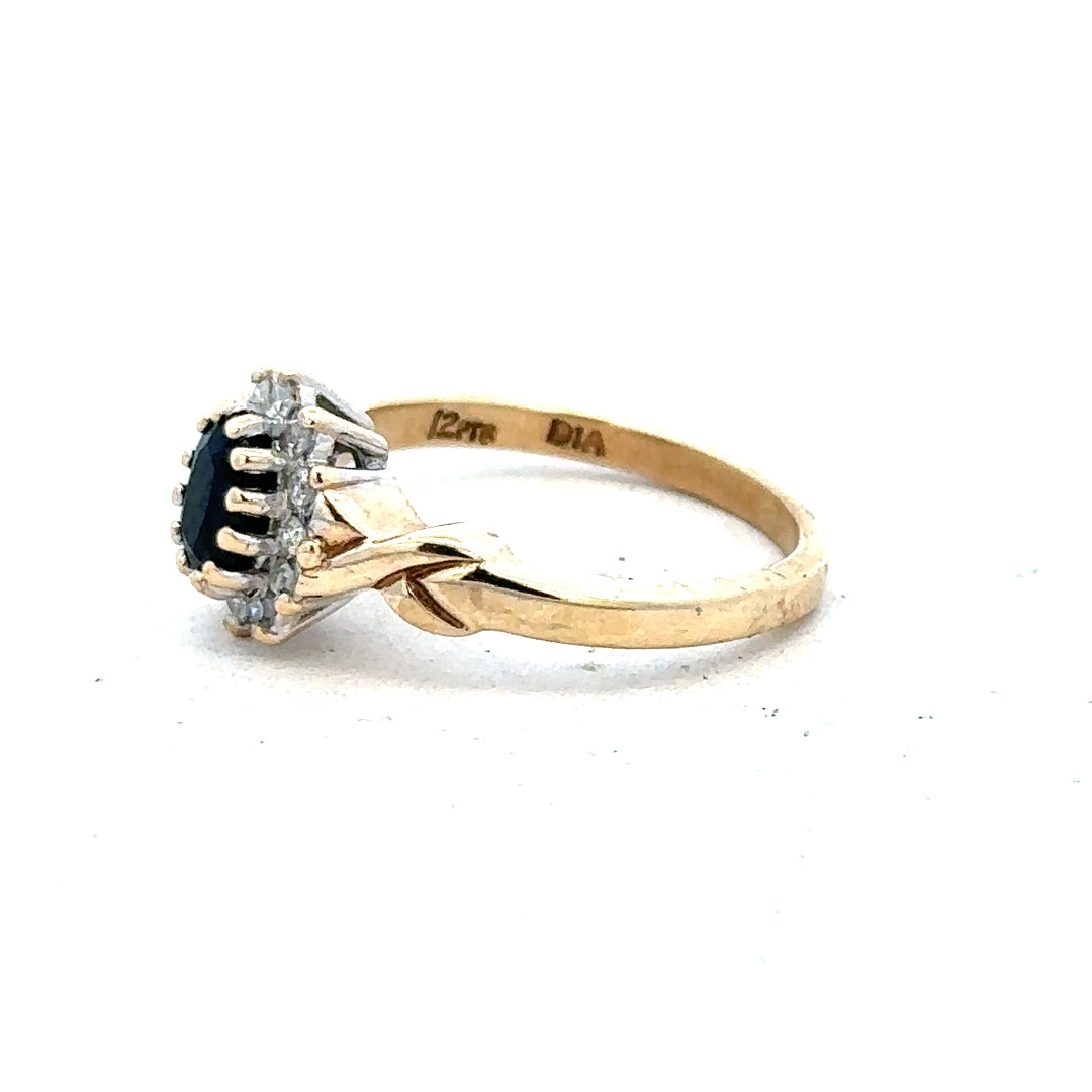 9ct yellow gold sapphire and diamond ring in size K1/2, featuring a sparkling gemstone and elegant gold band.