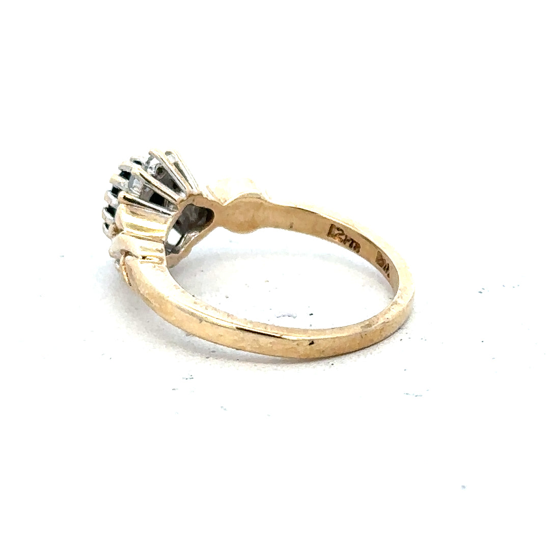 9ct yellow gold sapphire and diamond ring in size K1/2, featuring a vibrant sapphire center with sparkling diamonds.