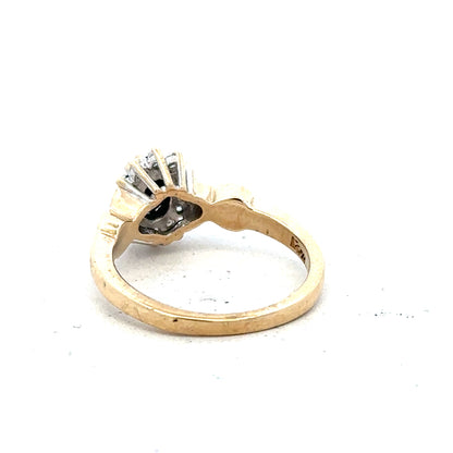 9ct yellow gold sapphire and diamond ring in size K1/2, featuring a central sapphire gemstone with diamond accents.