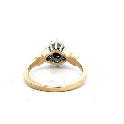 9ct yellow gold sapphire and diamond ring, size K1/2, featuring a vibrant sapphire centerpiece and sparkling diamonds.