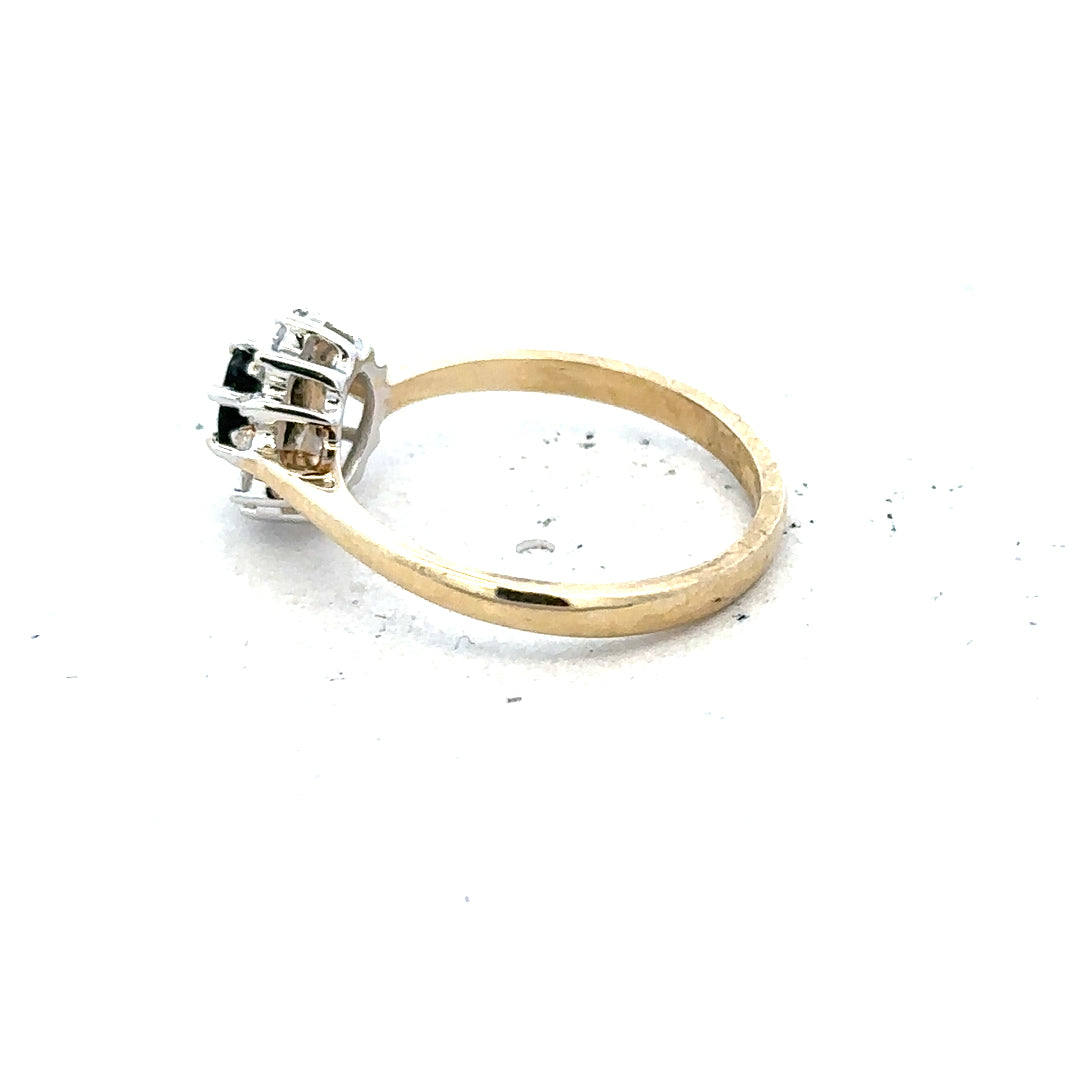9ct yellow gold sapphire and diamond ring in size L, featuring a vibrant sapphire centerpiece with sparkling diamonds.
