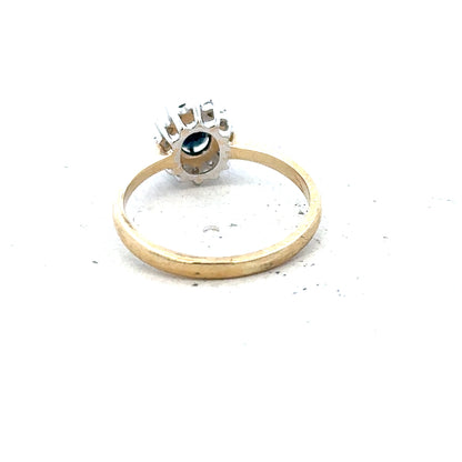 9ct yellow gold sapphire and diamond ring in size L, featuring a central sapphire with diamond accents, unbranded jewelry piece.