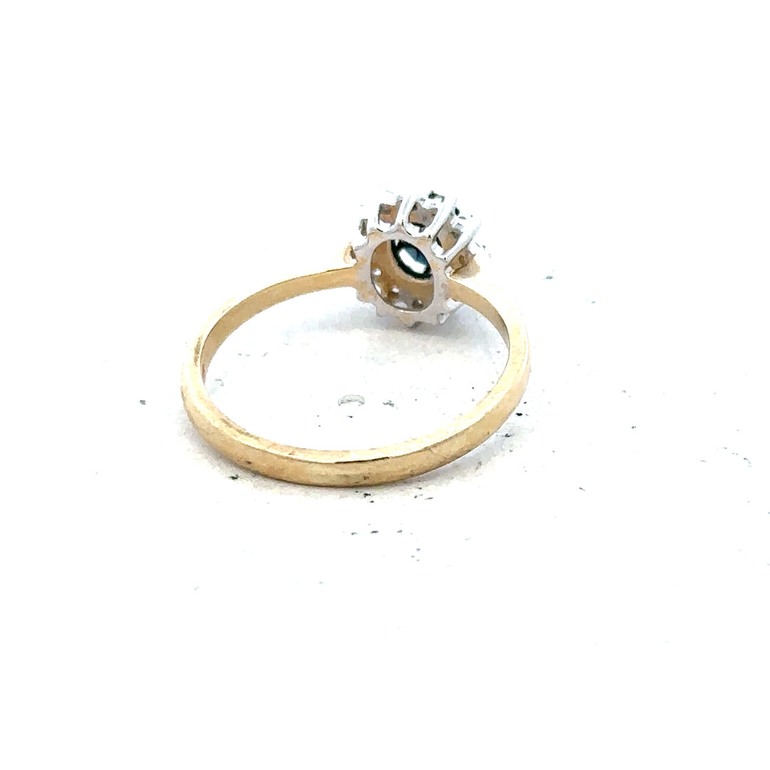 9ct yellow gold sapphire and diamond ring in size L, featuring a vibrant sapphire centerpiece and sparkling diamonds.