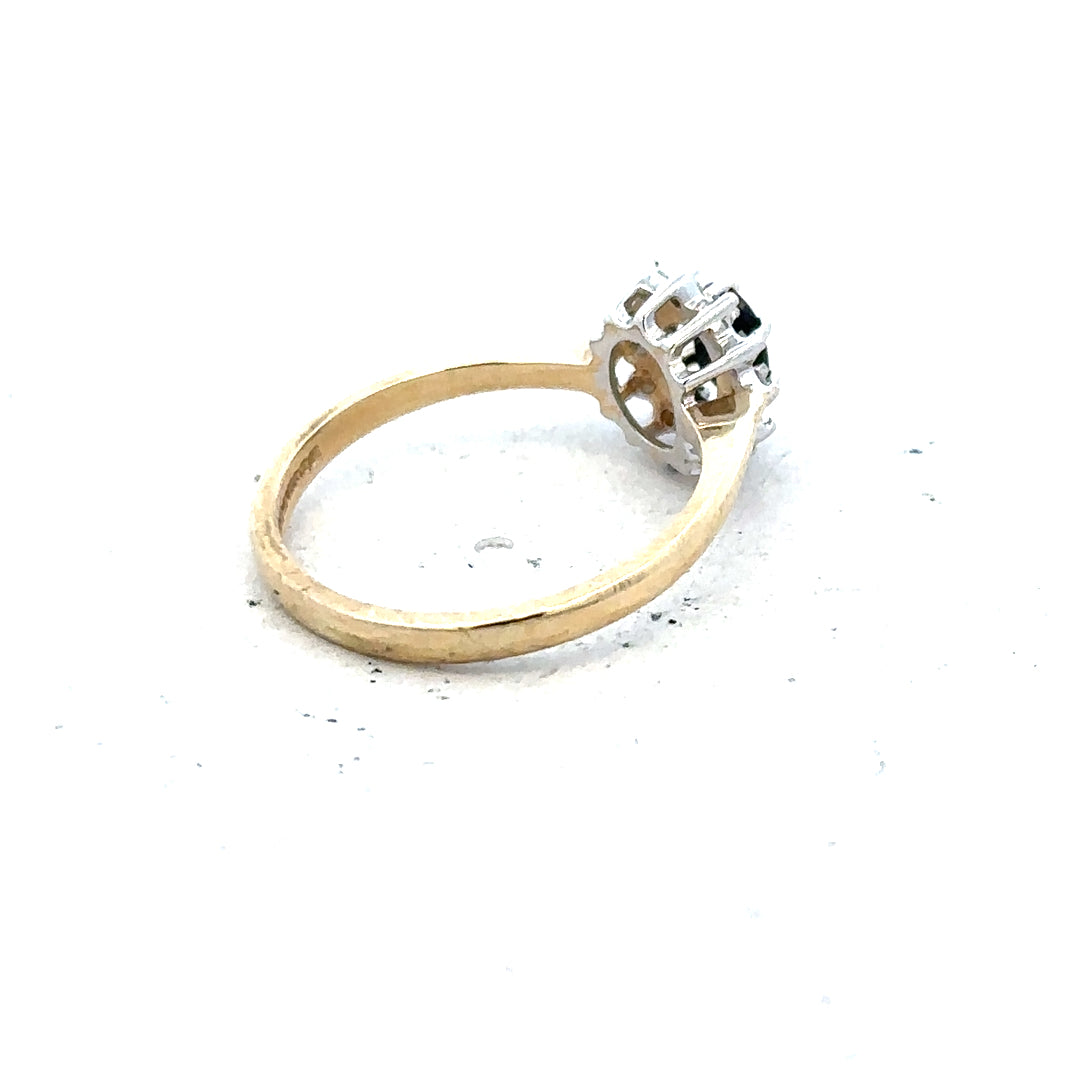 9ct yellow gold sapphire and diamond ring, size L, featuring a central sapphire gemstone and sparkling diamonds.