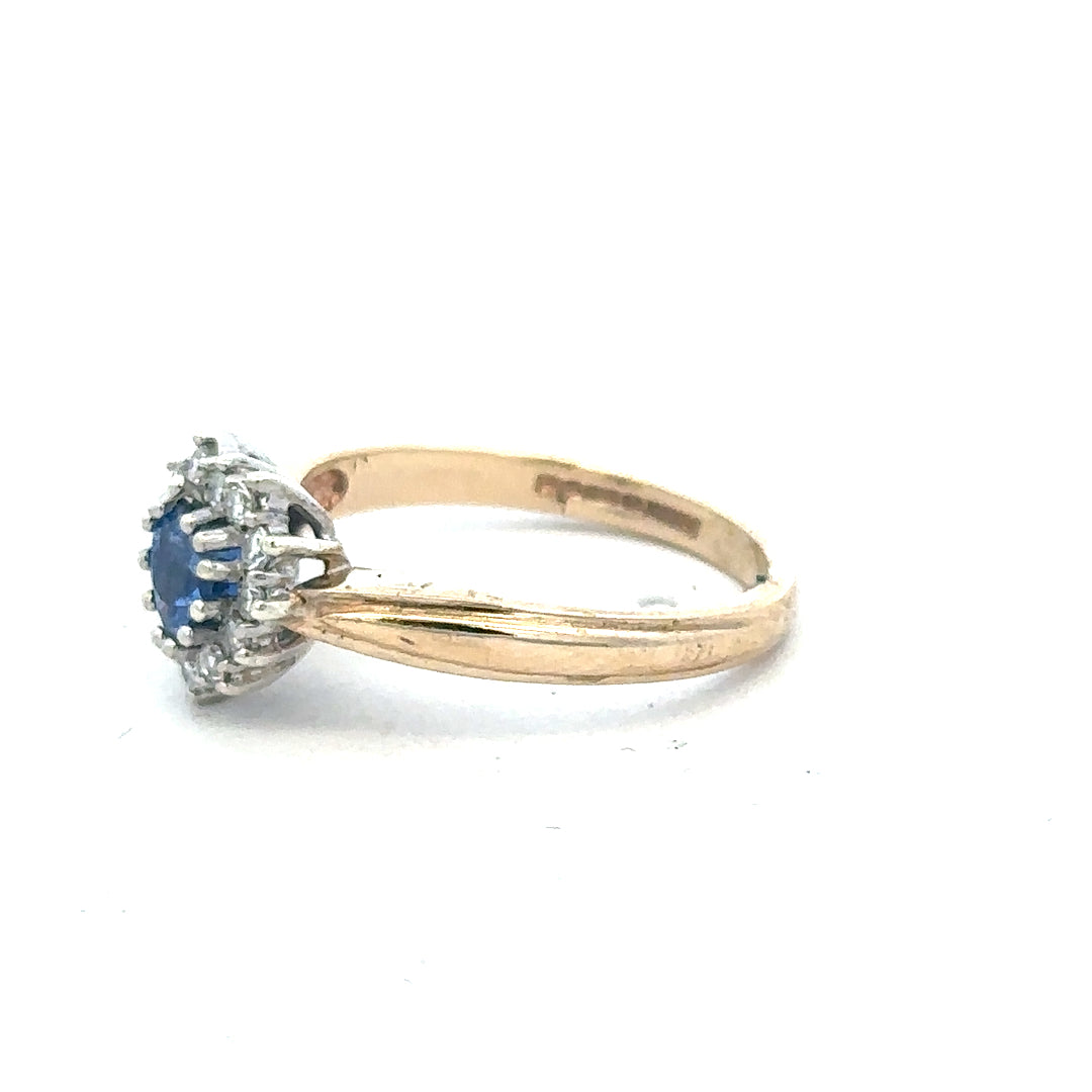 9ct yellow gold sapphire and diamond ring in size L1/2, featuring a central sapphire gemstone with diamond accents.