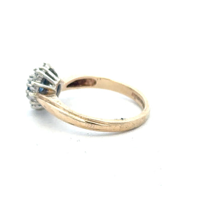 9ct yellow gold sapphire and diamond ring in size L1/2, featuring a sparkling gemstone design.