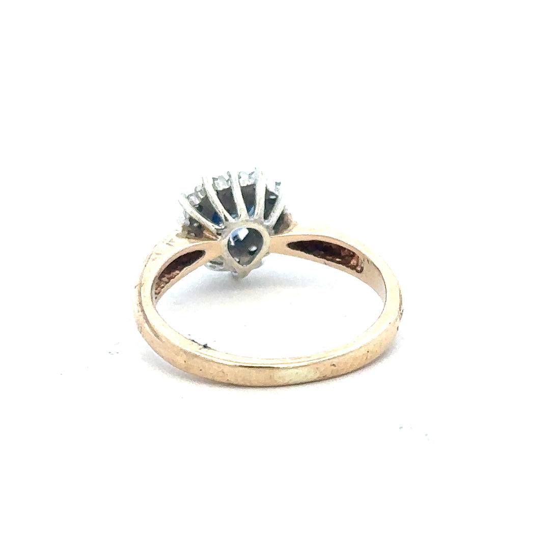 9ct yellow gold sapphire and diamond ring in size L1/2, featuring a detailed close-up of the elegant jewelry design.