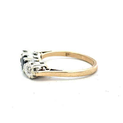 9ct yellow gold sapphire and diamond ring in size L1/2, featuring a detailed design and sparkling gemstones.
