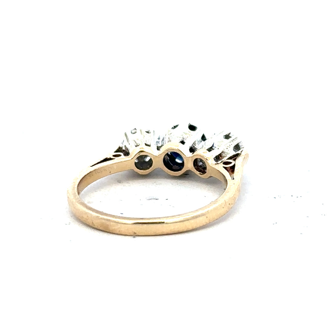 9ct yellow gold sapphire and diamond ring in size L1/2, featuring a sparkling gemstone and elegant design.