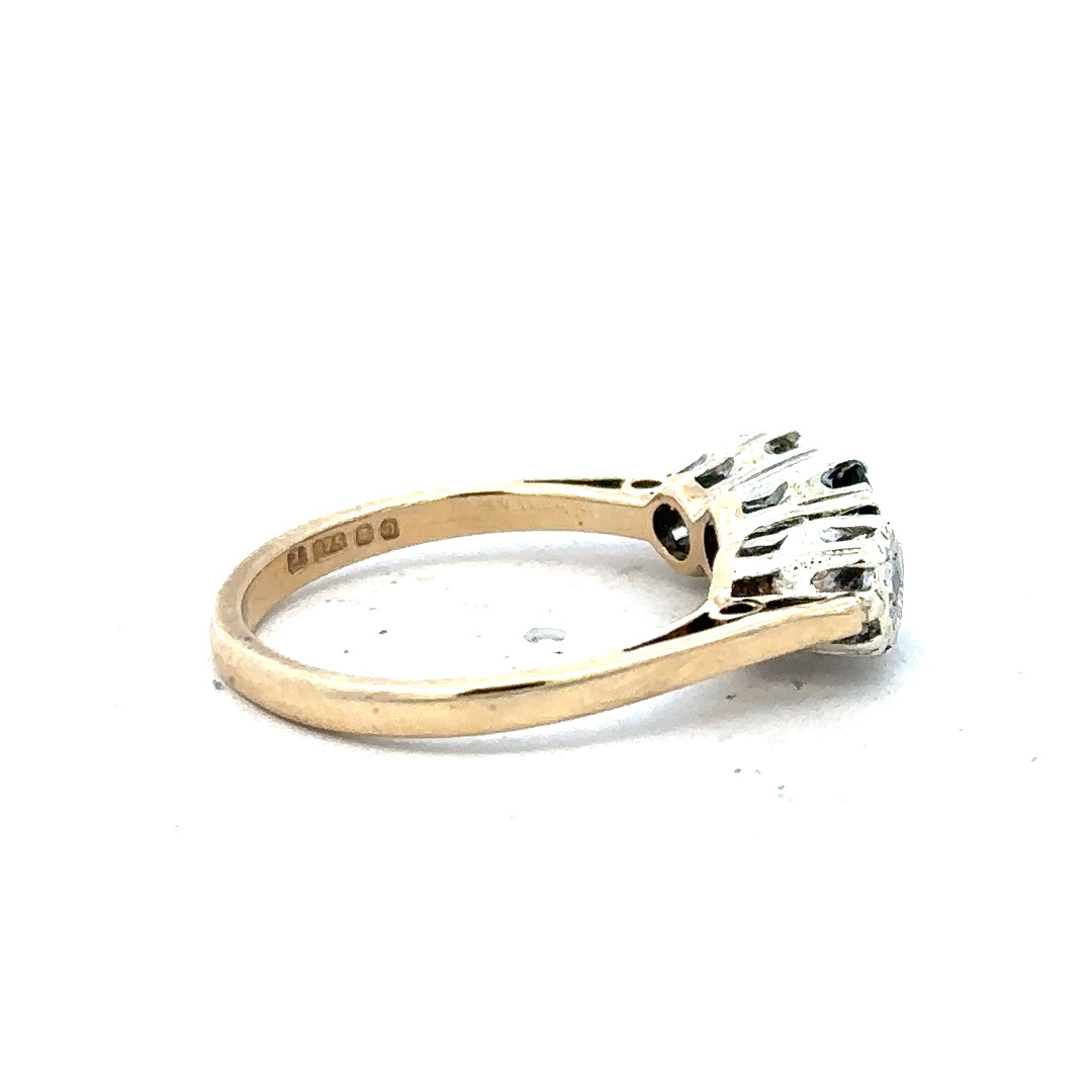 9ct yellow gold sapphire and diamond ring in size L1/2, featuring a polished band and sparkling gemstone accents.