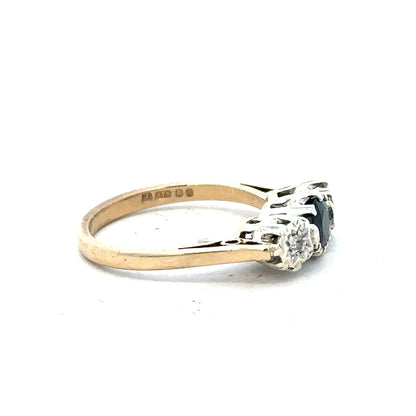 9ct yellow gold sapphire and diamond ring in size L1/2, featuring a elegant design and sparkling gemstones.