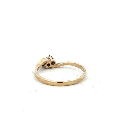 9ct yellow gold sapphire and diamond ring, size M, featuring a central sapphire gemstone displayed on a plain background.
