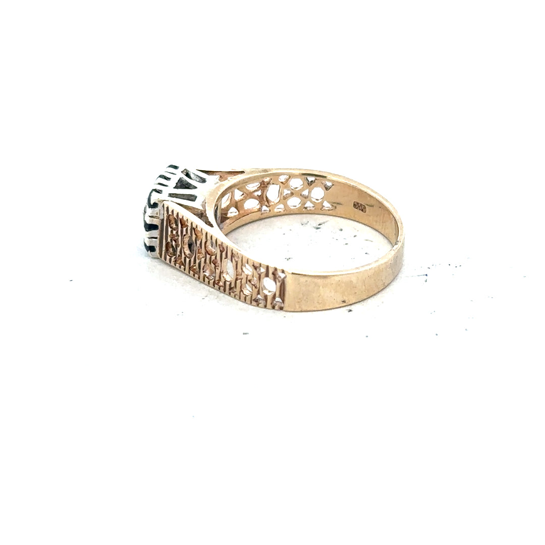 9ct yellow gold sapphire and diamond ring in size N1/2, featuring a detailed close-up of the elegant design.