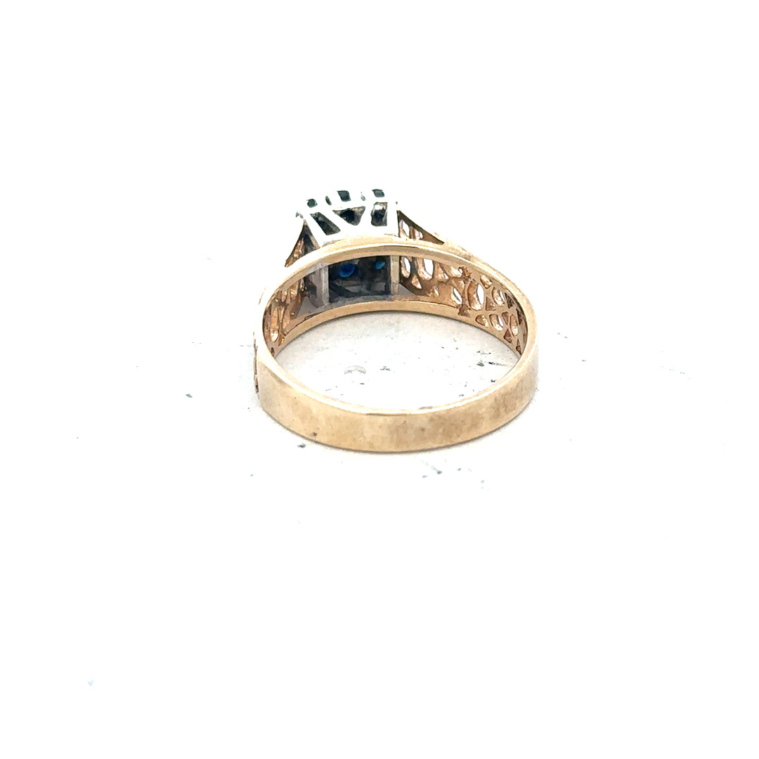 9ct yellow gold sapphire and diamond ring, size N1/2, featuring a detailed design with sparkling gemstones.