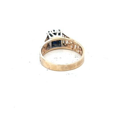 9ct yellow gold sapphire and diamond ring, size N1/2, featuring a detailed design with sparkling gemstones.