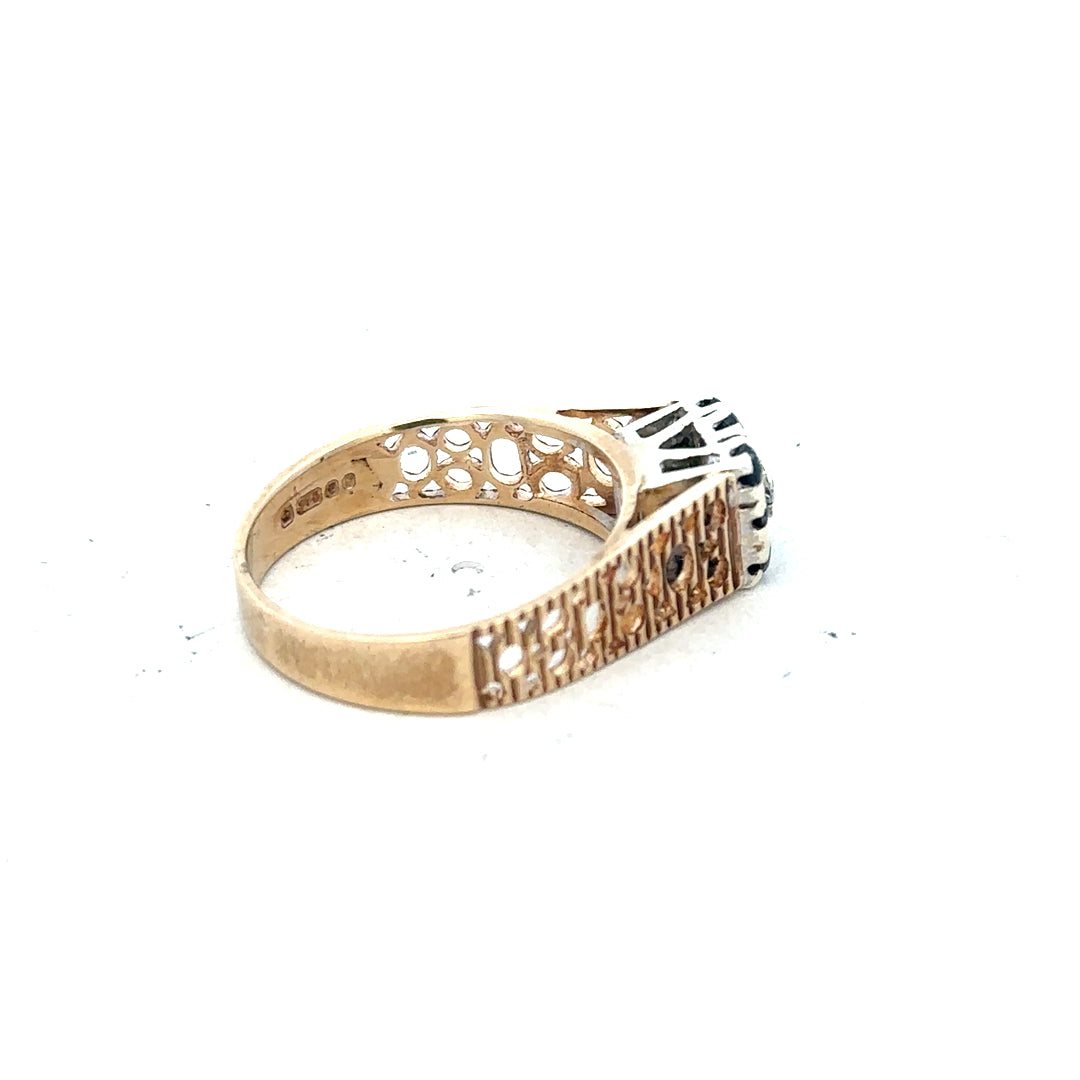 9ct yellow gold sapphire and diamond ring in size N1/2, featuring a detailed view of the elegant jewelry design.
