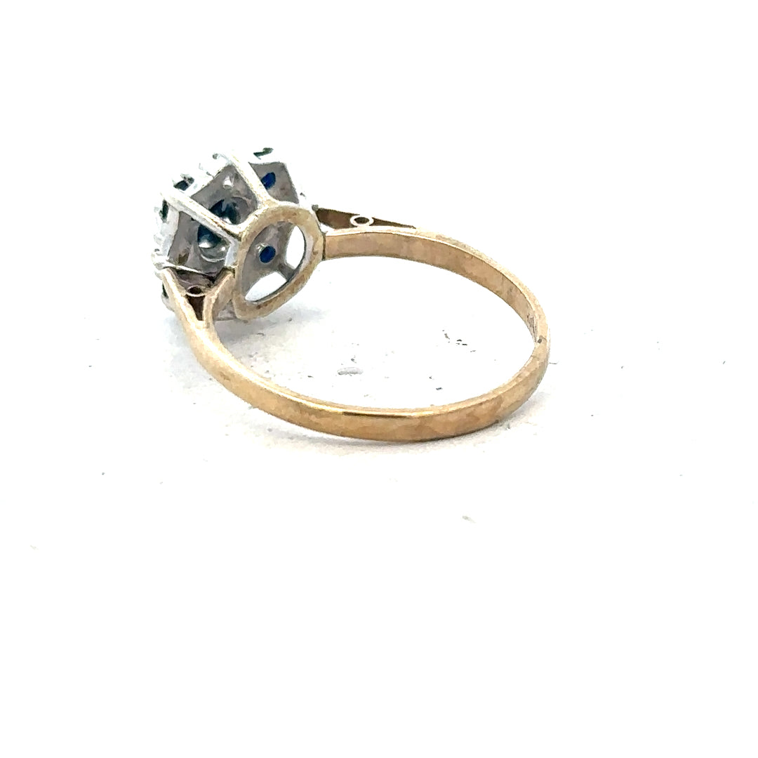9ct yellow gold sapphire and diamond ring in size P, featuring a central sapphire and sparkling diamonds on a classic band.