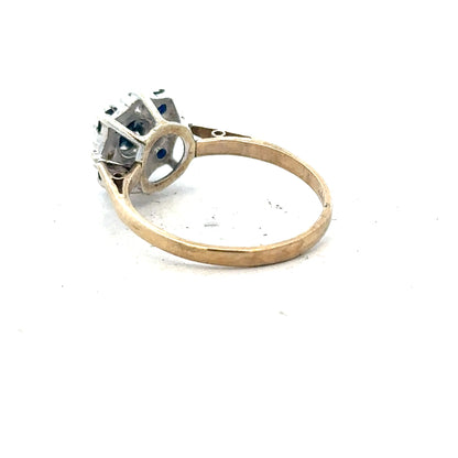 9ct yellow gold sapphire and diamond ring in size P, featuring a central sapphire and sparkling diamonds on a classic band.