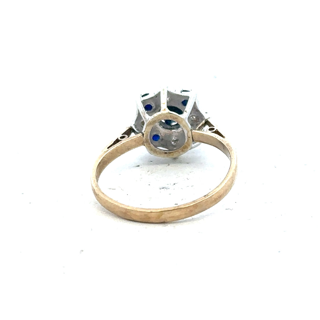 9ct yellow gold sapphire and diamond ring in size P, featuring a central sapphire gemstone and sparkling diamond accents.