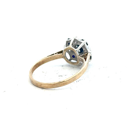 9ct yellow gold sapphire and diamond ring, size P, featuring a central sapphire gemstone and surrounding diamonds.