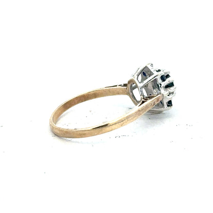 9ct yellow gold sapphire and diamond ring, size P, featuring a central sapphire gemstone with surrounding diamonds.