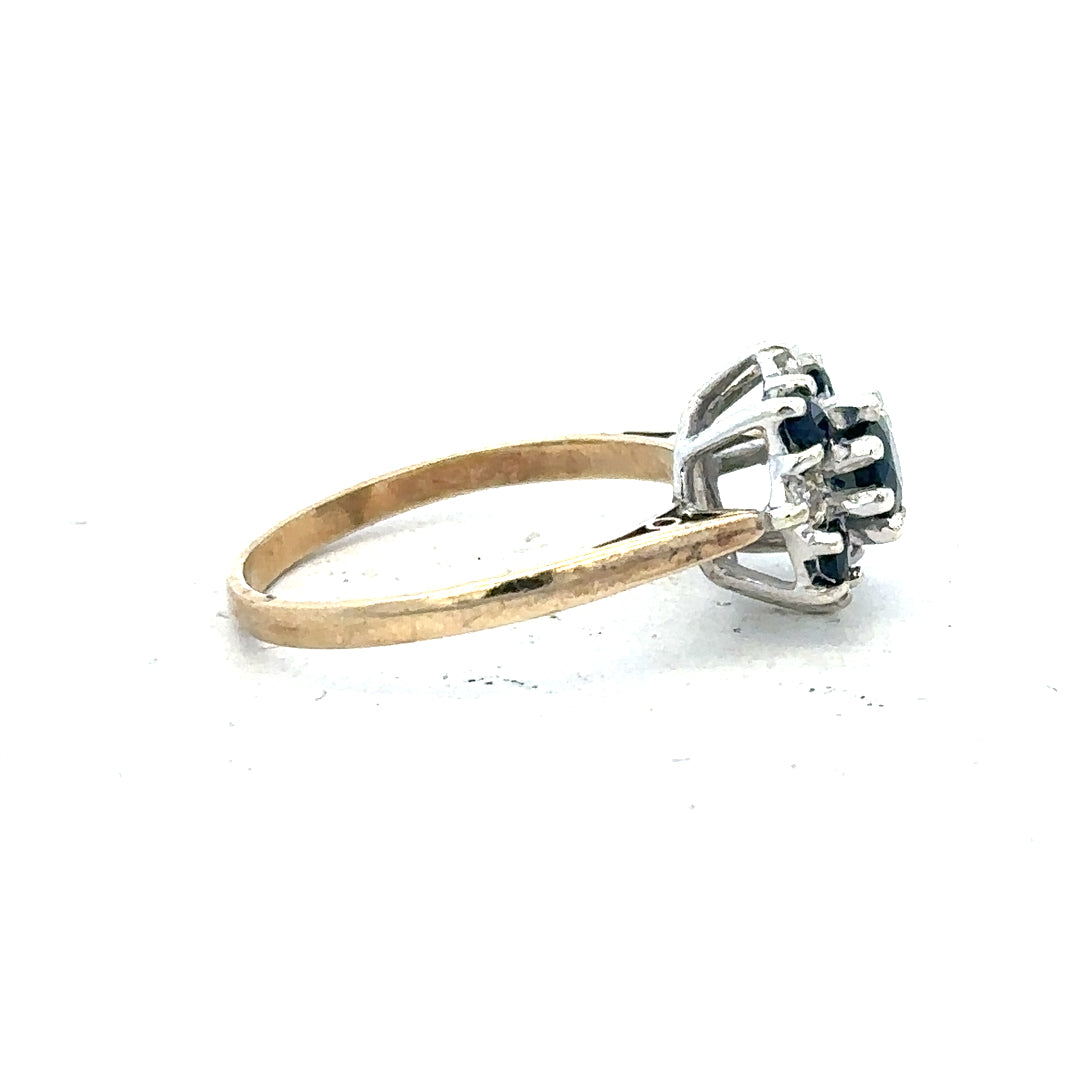 9ct yellow gold sapphire and diamond ring, size P, featuring a central sapphire with diamond accents, unbranded jewelry.
