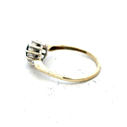 9ct yellow gold sapphire and diamond ring in size P, featuring a central sapphire with diamond accents, unbranded jewelry.