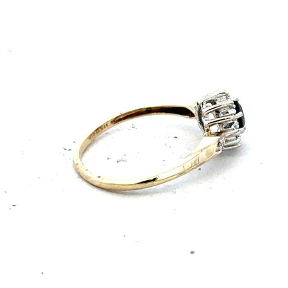 9ct yellow gold sapphire and diamond ring in size P, showcasing a sparkling gemstone design and elegant craftsmanship.