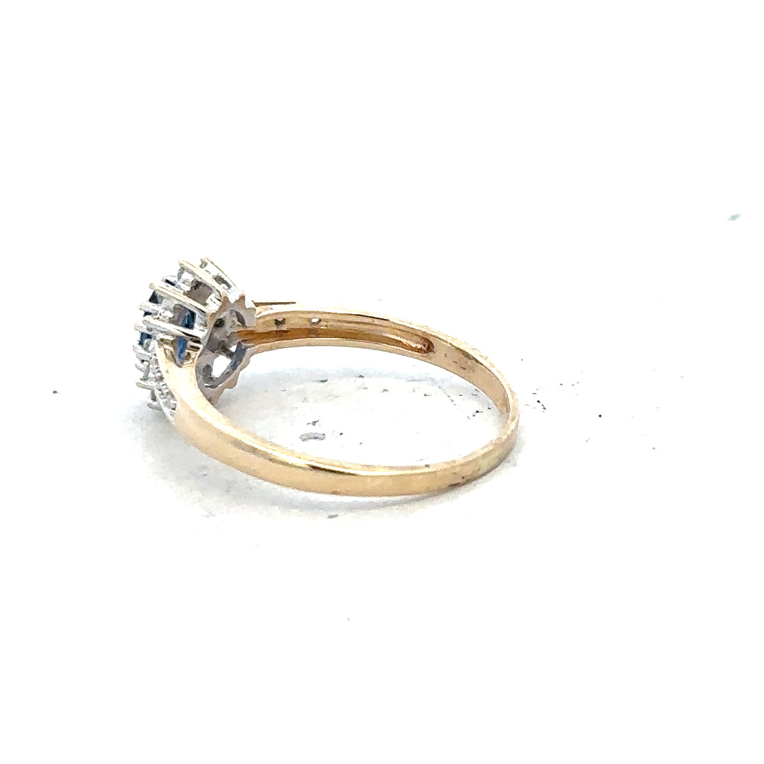9ct yellow gold sapphire and diamond ring, size P1/2, featuring a detailed design with sparkling gemstones.