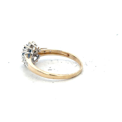9ct yellow gold sapphire and diamond ring, size P1/2, featuring a detailed design with sparkling gemstones.
