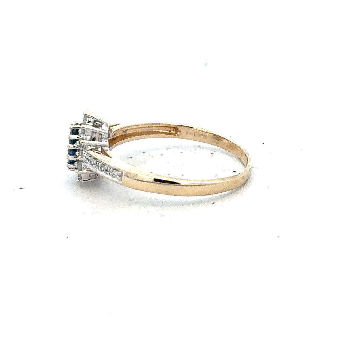 9ct yellow gold sapphire and diamond ring, size P1/2, featuring a sparkling sapphire and diamond accents.