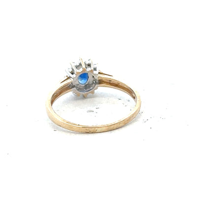 9ct yellow gold sapphire and diamond ring, size P 1/2, showcasing a vibrant sapphire centerpiece with sparkling diamonds.